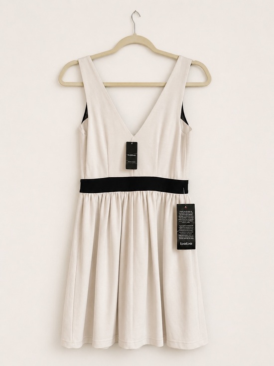 NWT Bebe Cream & Black Fit & Flare Dress Size Small NWT Bebe Cream & Black Fit & Flare Dress Size Small